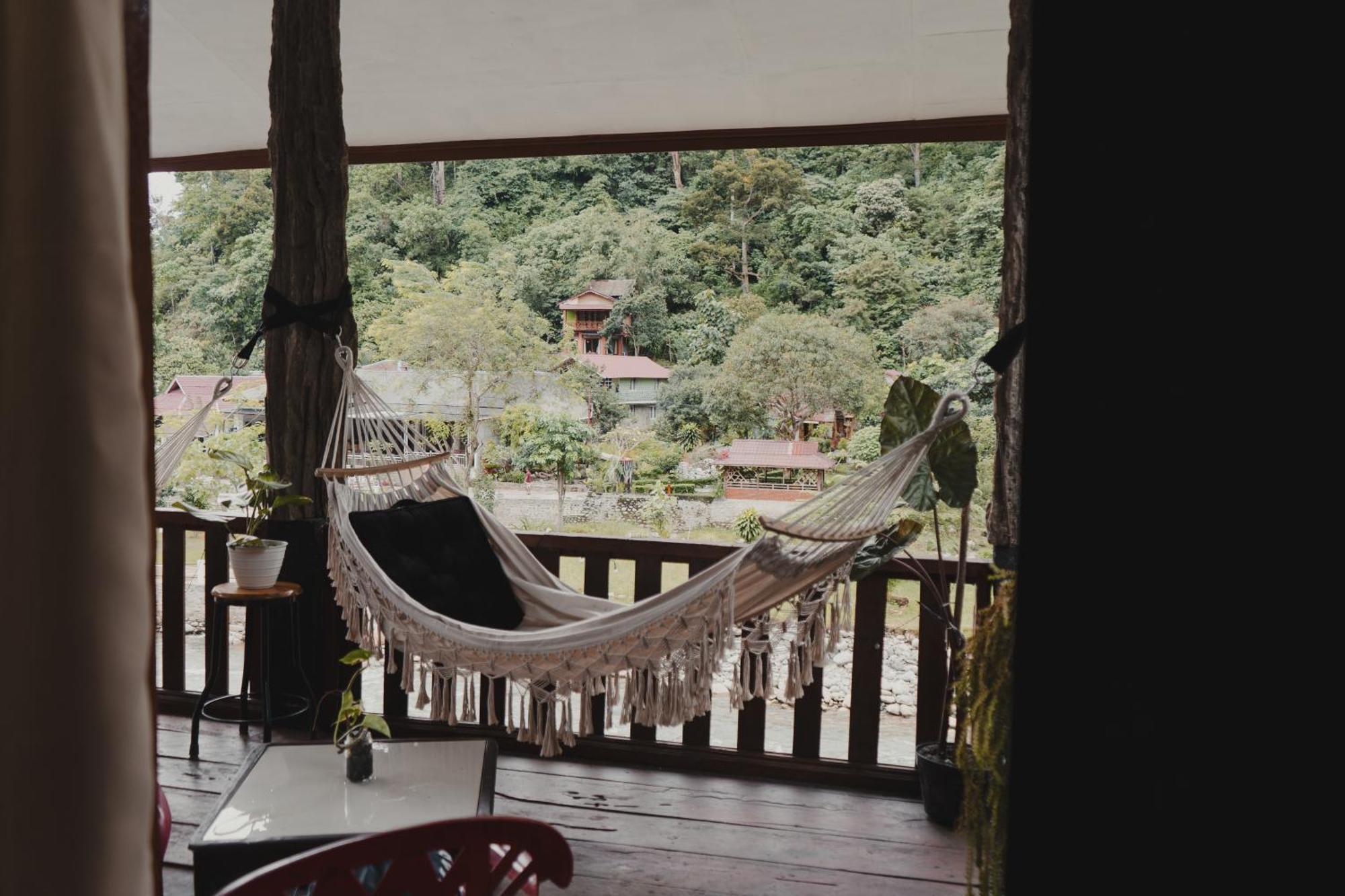 Hotel Charlys Little House à Bukit Lawang Extérieur photo