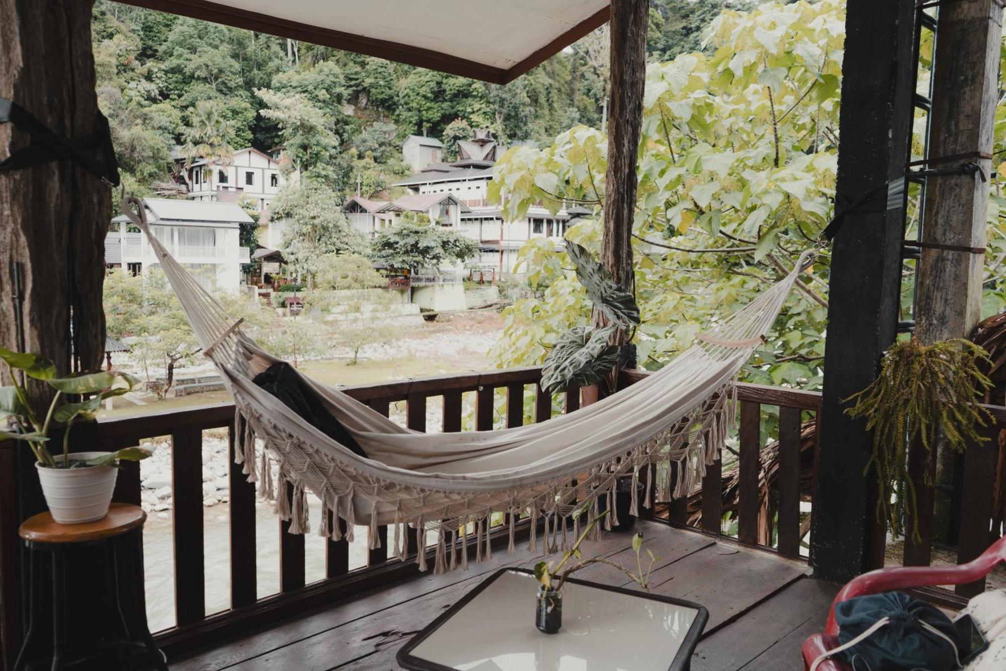 Hotel Charlys Little House à Bukit Lawang Extérieur photo